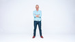 © Jacob Lund - Senior man standing with arms crossed