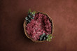 © kot500 - Newborn photography digital background prop. wicker basket with pink  fur on a painted canvas.