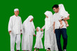Happy multi-generation muslim family in studio