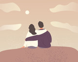 Young couple in love on sky background with clouds. A couple hugging and sitting on a mountain slope. 