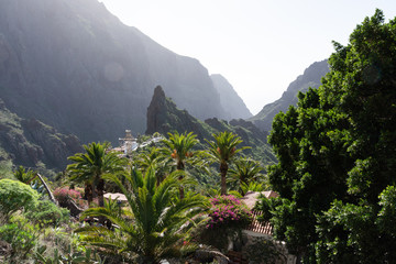 View of the streets of Maska village and canyon with tropical plants