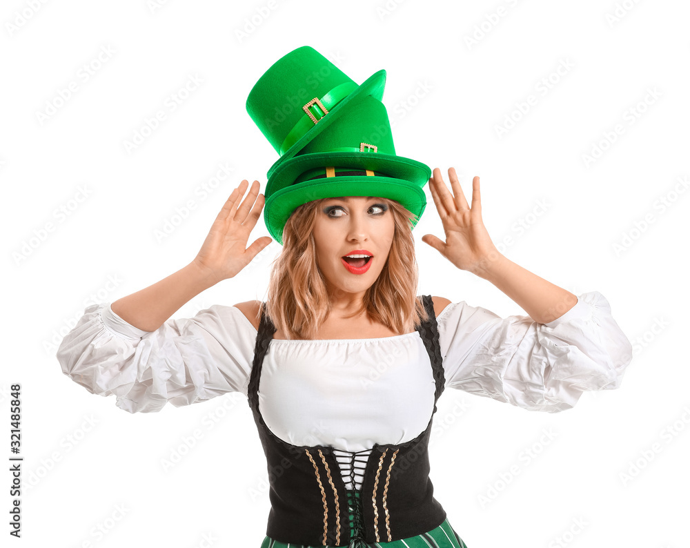Funny young woman on white background. St. Patrick's Day celebration