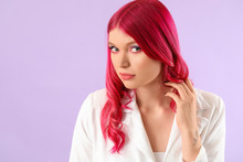 Beautiful Young Woman With Unusual Hair On Color Background