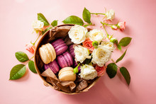 Box With Delicious Bright Macaroons And Flowers