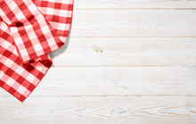 Napkin. Kitchen Towel Or Table Cloth On White Wooden Scene. Mock Up For Design. Top View.