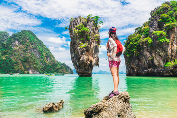 Wall Mural - Traveler woman on rock beach joy nature scenic landscape James Bond Island, Attraction famous landmark tourist travel Phuket Thailand summer holiday vacation trips, Tourism beautiful destination Asia