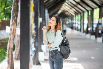 Poster - Happy young Asian University student.