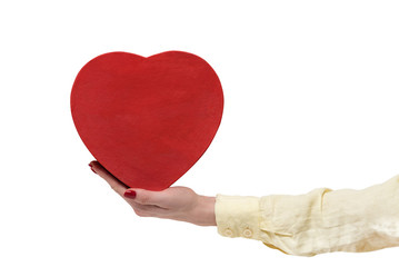 Wall Mural - Vintage style red heart shaped box on female hand isolated on white background. Front view