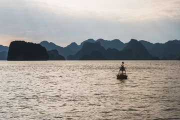 Panoramic view of Ha Long Bay area, a beautiful touristic place with karst mountains in the sea, in Vietnam