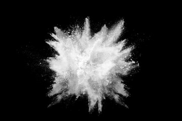 Wall Mural - White powder explosion on black background. Colored cloud. Colorful dust explode. Paint Holi.