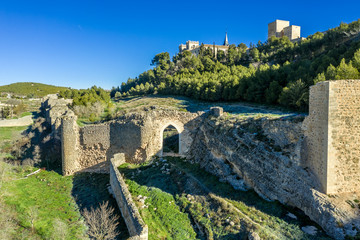 Wall Mural - Aerial sunny afternoon view of Ucles castle and monastery historic medieval walled town in Cuenca province Spain