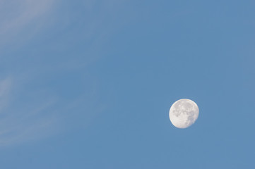 Moon visible during early morning two days after full moon