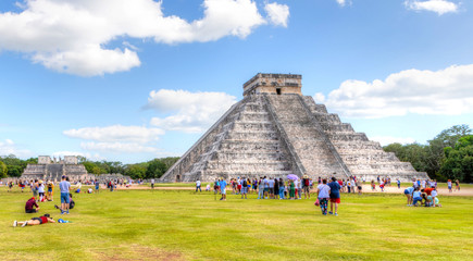 Wall Mural - Panorama of Ancient Chichen Itza in Yucatan, Mexico, With Unrecognizable Tourists