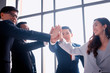 © FotoArtist - young business team working together at office. business hand shake