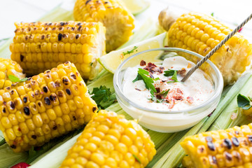 Grilled corn cobs in mexican style