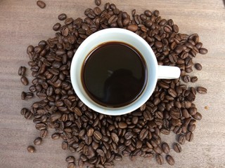 coffee beans on wooden background