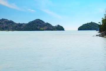 Wall Mural - beautiful seascape with the island on the background of blue sky on sun shine day.