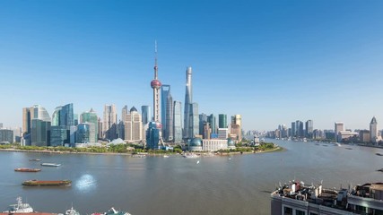 Fototapete - time lapse of beautiful shanghai cityscape, pudong skyline and busy huangpu river in the afternoon, China