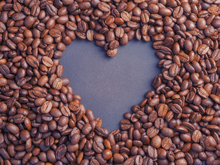 Wall Mural - Heart coffee frame made of coffee beans on burlap texture