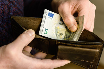 The wallet with euros.