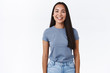© Cookie Studio - Carefree, cheerful asian brunette female student spend time partying with friends, celebrating winter holidays, laughing and smiling joyfully, showing positive vibe, standing white background