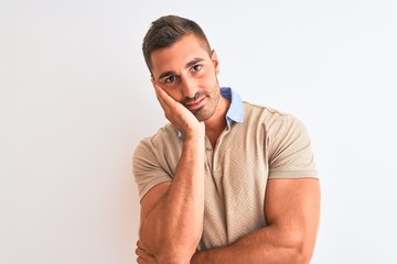 Wall Mural - Young handsome man wearing elegant t-shirt over isolated background thinking looking tired and bored with depression problems with crossed arms.