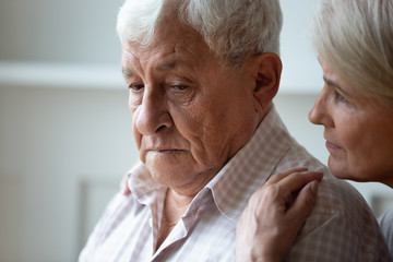 Wall Mural - Caring old wife support caress sad senior husband