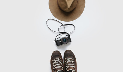 Wall Mural - hipster photographer essential items arranged on white background