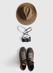Wall Mural - hipster photographer essential items arranged on white background