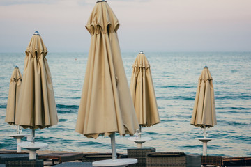 closed beach umbrellas