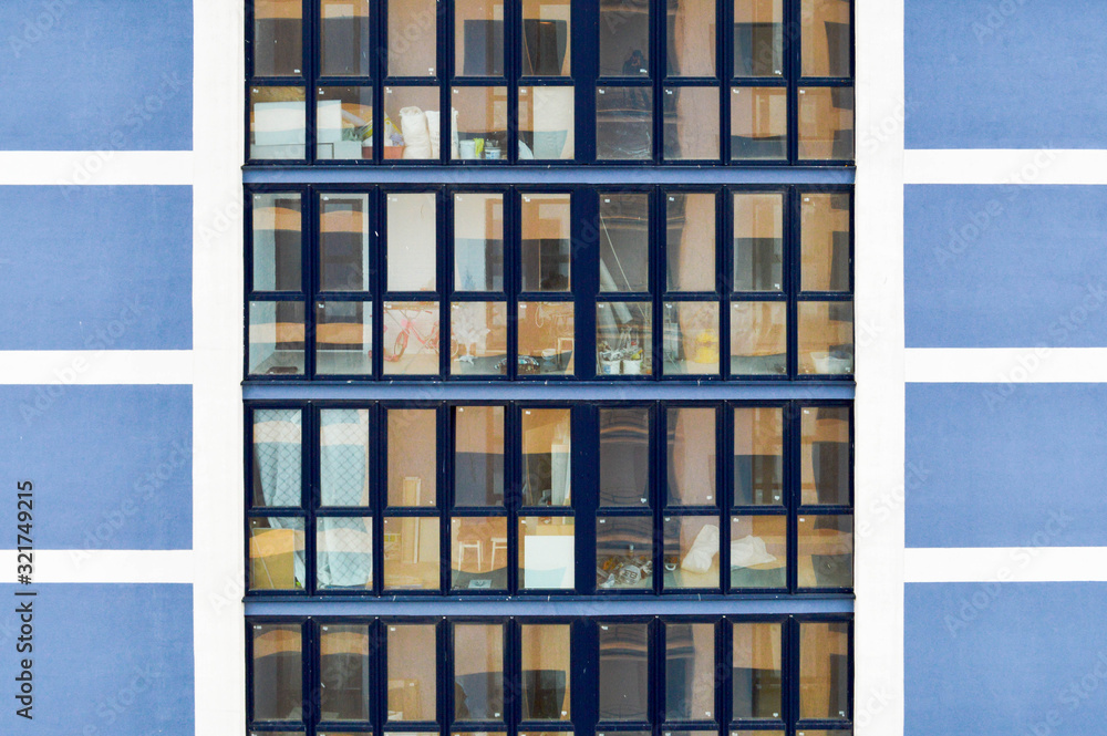 Beautiful modern blue glass fiberglass windows of the facade wall of a ...