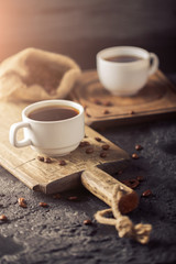 Wall Mural - Ground coffee and coffee beans on old cafe table.