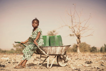 real indigenous youngster saving healthy water in a village
