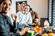 © Yakobchuk Olena - Positive delighted young people having time for dinner