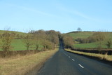 Fototapeta  - Straight hill road