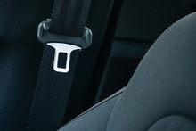 Seat Belt In A Car Interior Close-up. The Concept Of Life Insurance And Safe Driving.