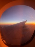 Fototapeta  - A380plane window sunset view