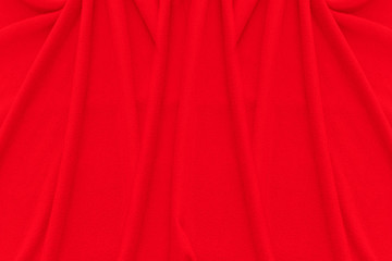 Wall Mural - Red fabric texture background. Abstract cloth backdrop with soft waves.