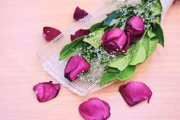 Red roses on a wooden floor, Valentine's Day.