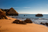 Fototapeta Morze - high cliffs and high tide on the shore of the Atlantic Ocean. Portugal. Algarve.