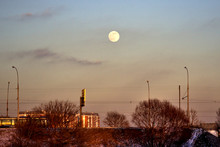 Winter City Evening Landscape With Full Moon