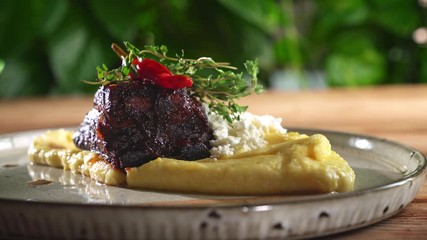 Wall Mural - Cornmeal porridge with grilled meat and cottage cheese.