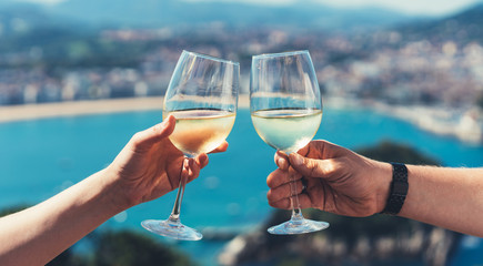 drink two glasses white wine sea nature holidays, closeup romantic couple toast with alcohol, happy 