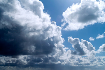 Gray clouds in blue sky