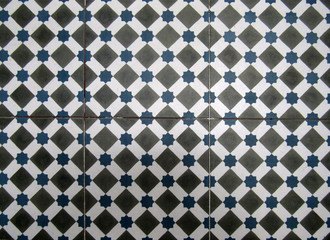 Checkered traditional Cuban ceramic mosaic tile background pattern. Architectural mosaic detail, abstract background for street, bath and pool. Ornamental pattern for street and interior design