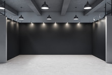 Gallery Interior With Empty Black Wall And Concrete Floor.