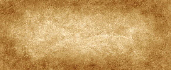 brown texture background in old vintage crumpled brown paper design with antique stained dark brown 