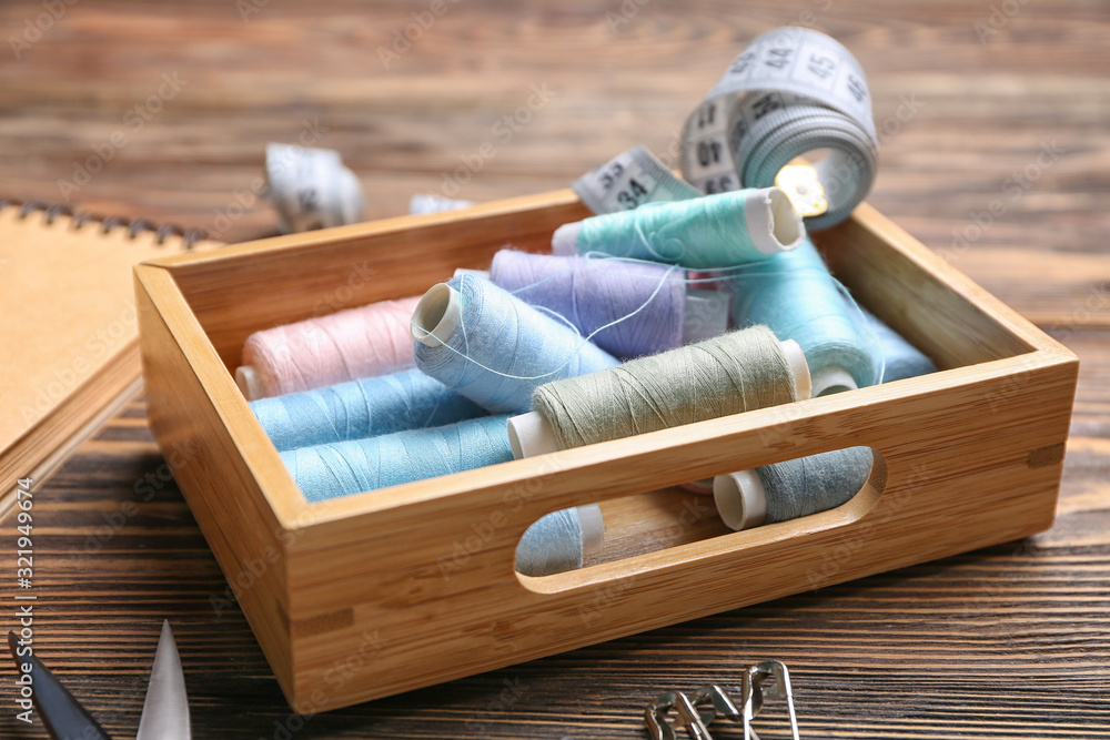 Set of tailor's supplies on table