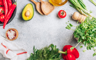 Wall Mural - Fresh organic ingredients for healthy cooking or salad making on light gray background. Diet food concept. Eco or zero waste concept. Top view.