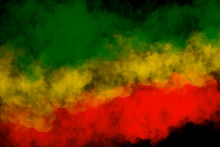 Green Yellow Red Smoke On Black Background ,reggae Background Concept